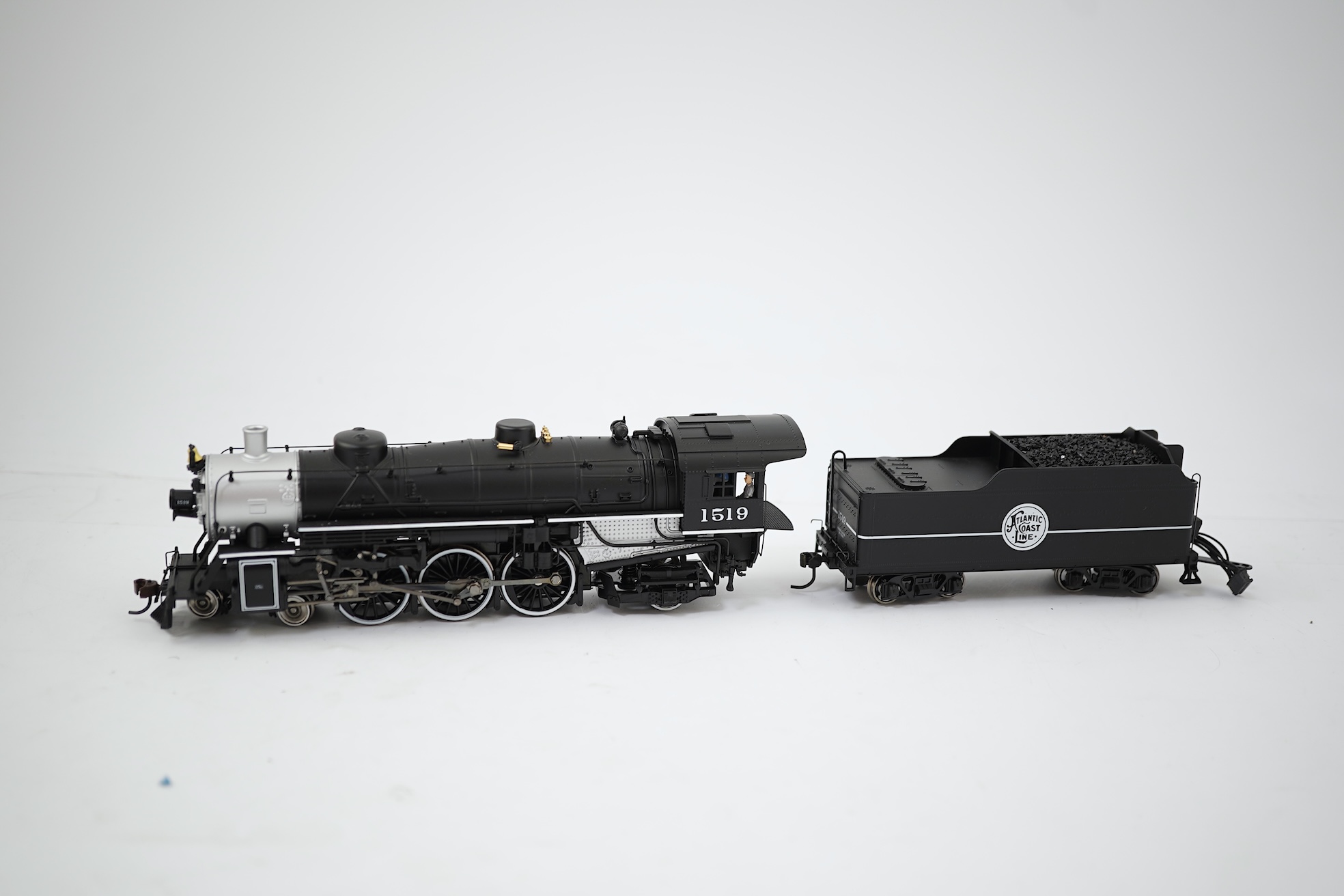A boxed HO gauge Broadway Limited Paragon 2 Series (1055) model of Atlantic Coast Line 1519, 4-6-2 locomotive with bogie tender, powered for two rail operation.